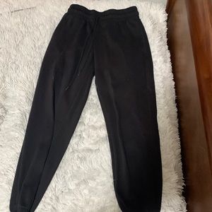 Black sweatpants , thick material